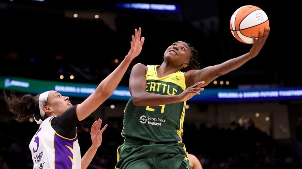 Jewell Loyd #24 of the Seattle Storm shoots against Dearica Hamby #5 of the Los Angeles Sparks during the third quarter at Climate Pledge Arena on June 06, 2023 in Seattle, Washington. (Photo by Steph Chambers/Getty Images)
