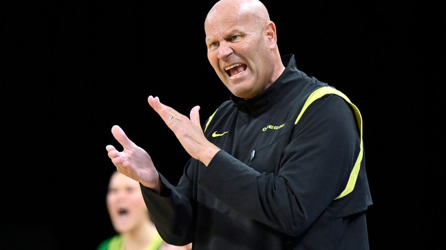 Oregon head coach Kelly Graves applauds his team after a play against Washington during the second half of an NCAA college basketball game in the first round of the Pac-12 women's tournament Wednesday, March 1, 2023, in Las Vegas. (AP Photo/David Becker)