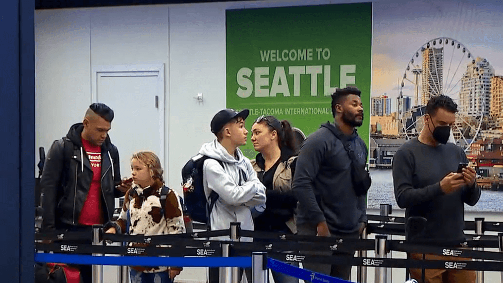 FILE - Travelers wait in line at Seattle-Tacoma International Airport. The TSA said this week it is prepared to screen high volumes of summer passengers at airport security checkpoints. (KOMO News)